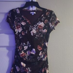 Pretty women's black blouse with roses on it. Short sleeves Size Small